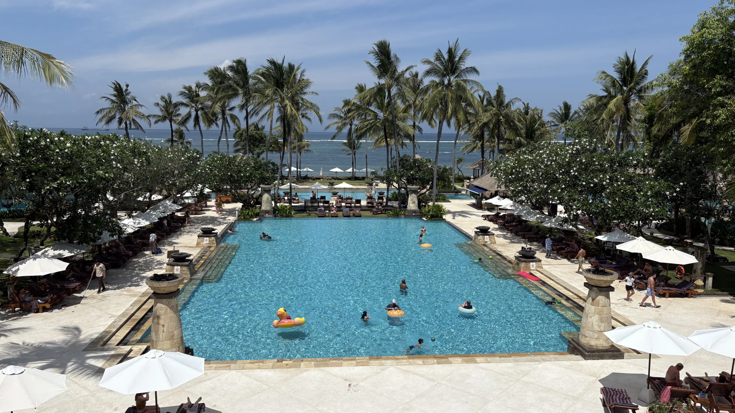 A view of the serene lagoon pool at the Conrad Bali resort